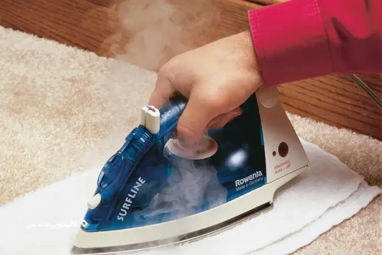 استفاده از دستگاه اتو بخاربرای رفع کوبیدگی فرش با پایه مبل